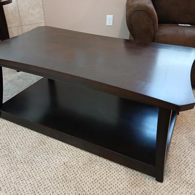 Two tone finish round coffee table on casters - easy to move!