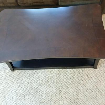 Two tone finish round coffee table on casters - easy to move!