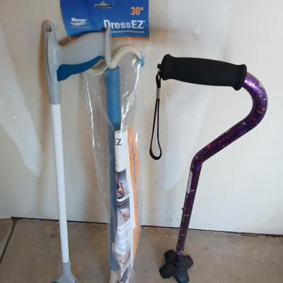 Adjustable Nova metal cane, Reacher -grabbing tool, and Dress-Ez assist with dressing tool