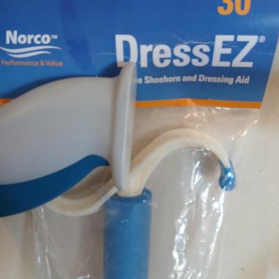 Adjustable Nova metal cane, Reacher -grabbing tool, and Dress-Ez assist with dressing tool