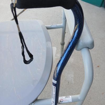 Mobility commode with an adjustable walking cane