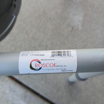 Mobility commode with an adjustable walking cane