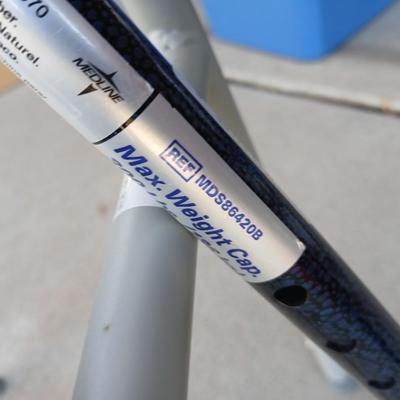 Mobility commode with an adjustable walking cane