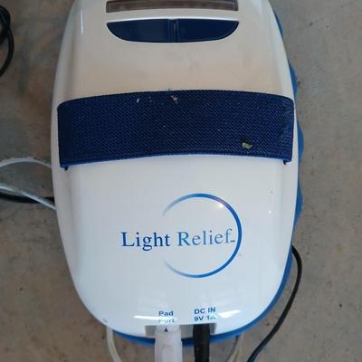 Light Relief healing lights massager and a Dr. Scholls Perfect reach massager