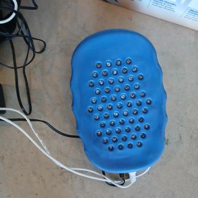 Light Relief healing lights massager and a Dr. Scholls Perfect reach massager