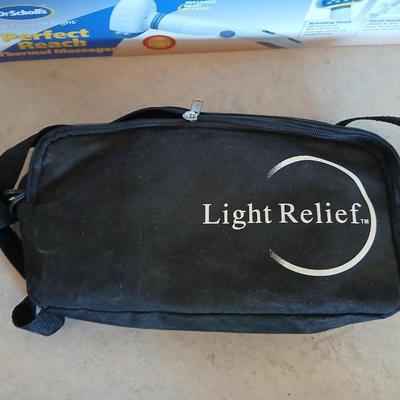 Light Relief healing lights massager and a Dr. Scholls Perfect reach massager