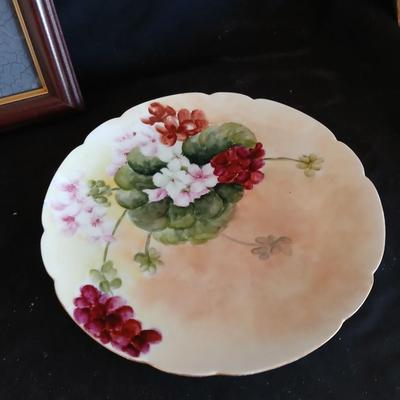 Antique China plates with a vase and a framed friends poem