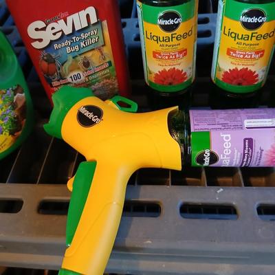 Fertilizers for your plants - Miracle grow and some stakes for trees