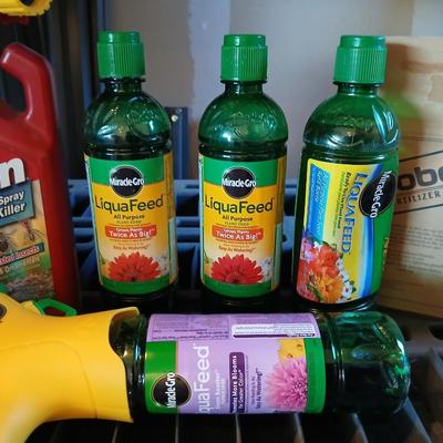 Fertilizers for your plants - Miracle grow and some stakes for trees