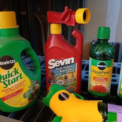 Fertilizers for your plants - Miracle grow and some stakes for trees