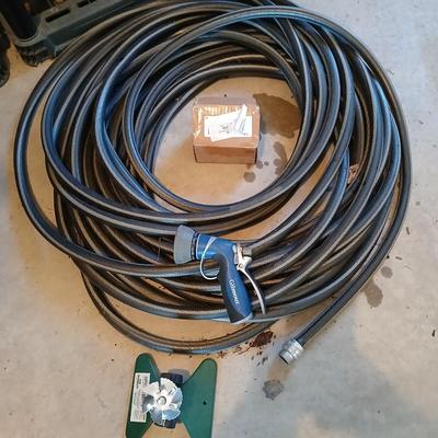 Nice garden hose with sprinkler and spray nozzle's