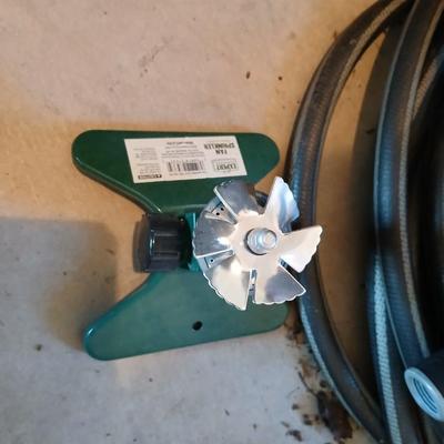 Nice garden hose with sprinkler and spray nozzle's