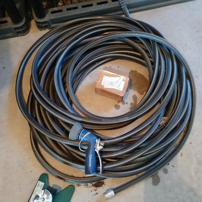 Nice garden hose with sprinkler and spray nozzle's