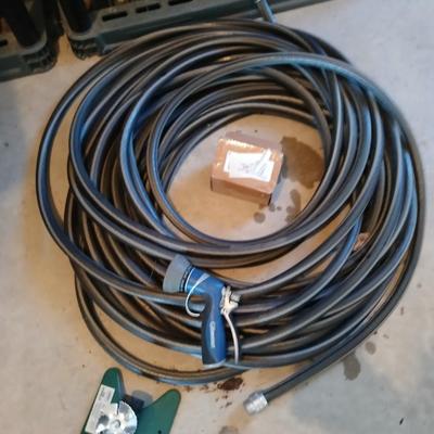 Nice garden hose with sprinkler and spray nozzle's