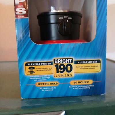 Vintage metal Coleman cooler with a Coleman classic LED lantern new in the box!