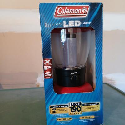Vintage metal Coleman cooler with a Coleman classic LED lantern new in the box!