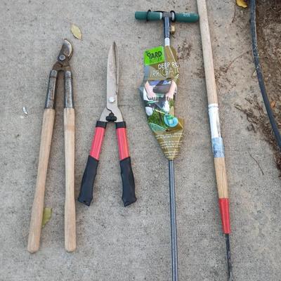 Yard and garden tools -whoppers - Trimmers - weed fork and a brand-new deep rod irrigation tool