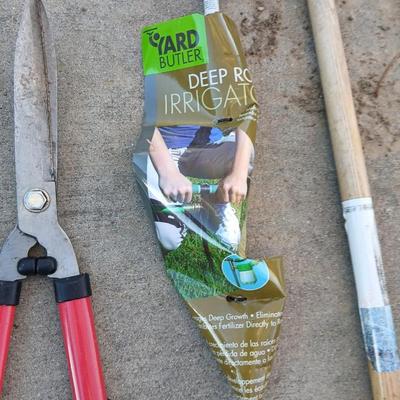Yard and garden tools -whoppers - Trimmers - weed fork and a brand-new deep rod irrigation tool