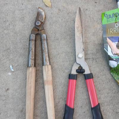 Yard and garden tools -whoppers - Trimmers - weed fork and a brand-new deep rod irrigation tool