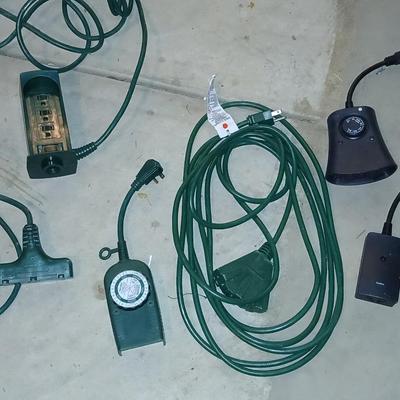 Variety of Green extension cords and timers