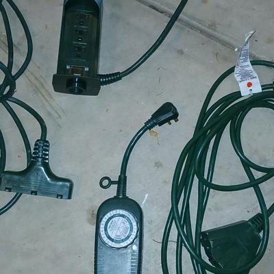 Variety of Green extension cords and timers