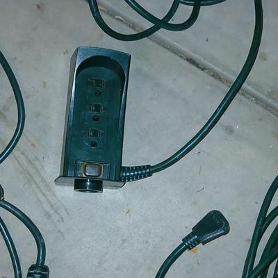 Variety of Green extension cords and timers