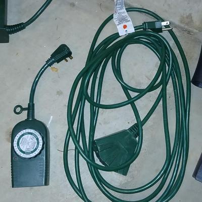 Variety of Green extension cords and timers