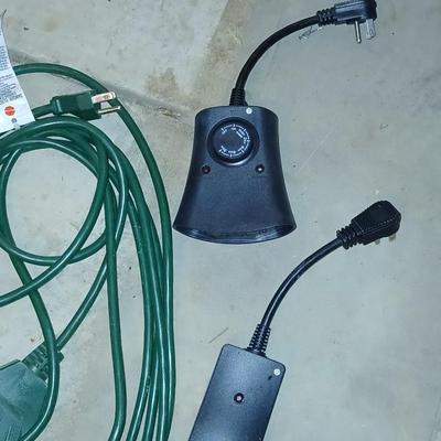 Variety of Green extension cords and timers
