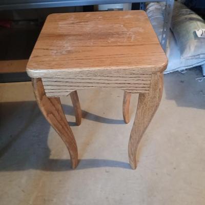 Small oak stand / table with bouquet of beautiful faux flowers in a large pot