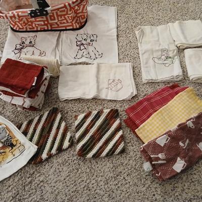 Kitchen towels - embroidered linens in a collapsible basket