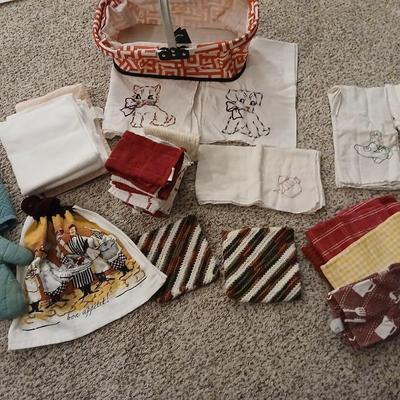 Kitchen towels - embroidered linens in a collapsible basket