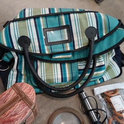 Savy caddy bag carry on size with curling iron, candle, decorative box, magnifier, and more