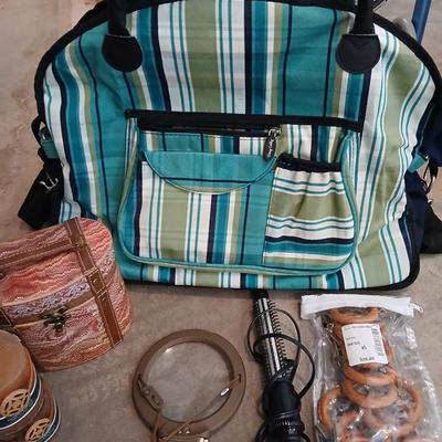 Savy caddy bag carry on size with curling iron, candle, decorative box, magnifier, and more