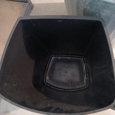 Metal lidded trash can with two additional trash cans