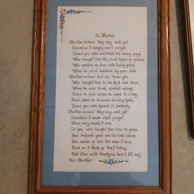 Three framed wall art and a small turtle figure