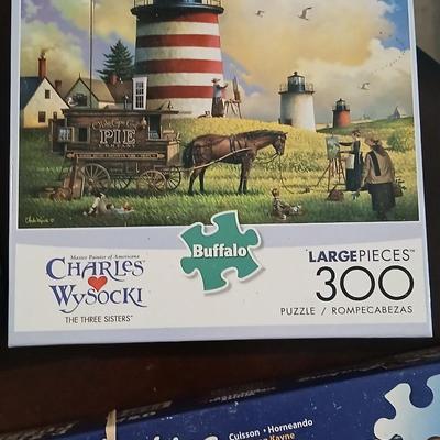 Four puzzles two are new with two Abacus
