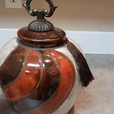 Large, lidded urn style vase with a candle holder
