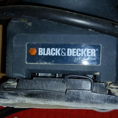 Black and decker electric sander with some sandpaper