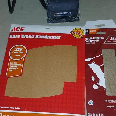 Black and decker electric sander with some sandpaper