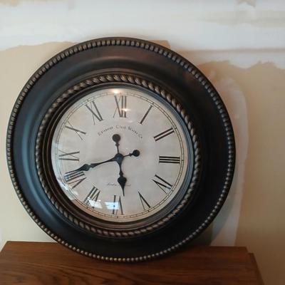 Drop leaf table on casters with Large Edinburgh Clock works co. wall clock