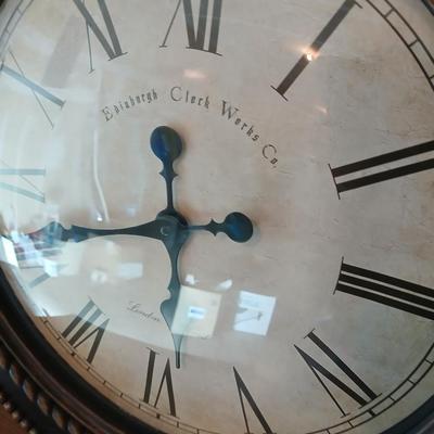 Drop leaf table on casters with Large Edinburgh Clock works co. wall clock