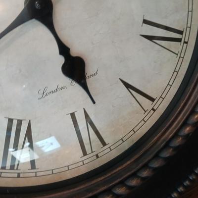 Drop leaf table on casters with Large Edinburgh Clock works co. wall clock