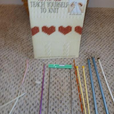 Large wicker basket with Knitting needles, and skeins of yarn - Teach yourself how to knit!
