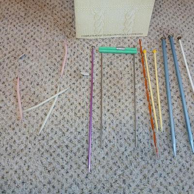 Large wicker basket with Knitting needles, and skeins of yarn - Teach yourself how to knit!