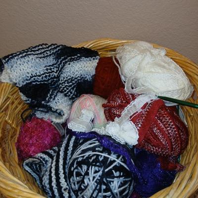 Large wicker basket with Knitting needles, and skeins of yarn - Teach yourself how to knit!