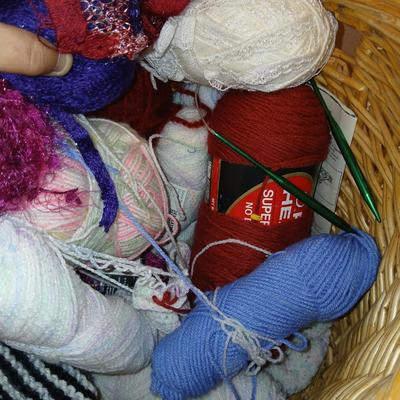 Large wicker basket with Knitting needles, and skeins of yarn - Teach yourself how to knit!