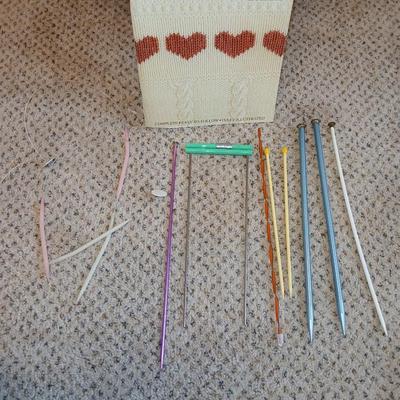 Large wicker basket with Knitting needles, and skeins of yarn - Teach yourself how to knit!