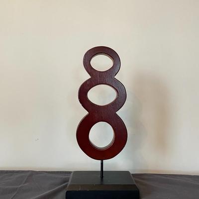 Wooden Connected Circles Statue in a Base