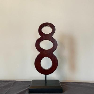 Wooden Connected Circles Statue in a Base