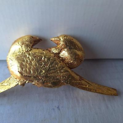 2 golden Wooden animals